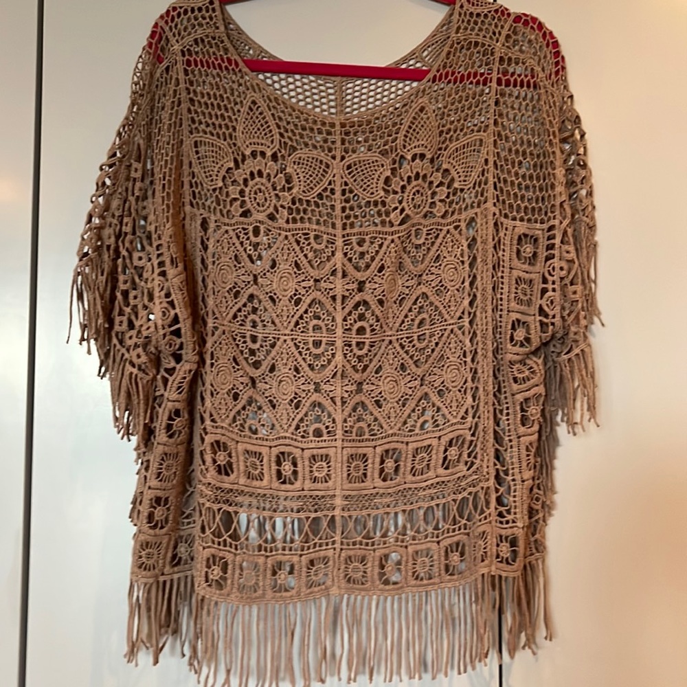 Embroidered top with tassels
